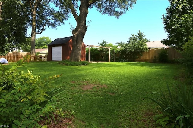 4225 Terry Dr, Chesapeake, VA 23321 - view of yard with an outdoor structure and a detached garage