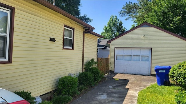 2209 Saint Denis Ave, Norfolk, VA 23509 - view of home's exterior with driveway, a garage, and an outbuilding