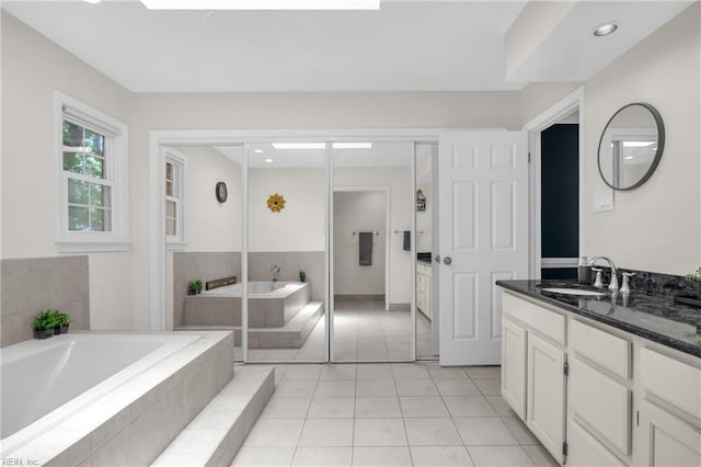 605 Hollygate Ln, Chesapeake, VA 23322 - bathroom featuring vanity, a bath, tile patterned floors, and recessed lighting