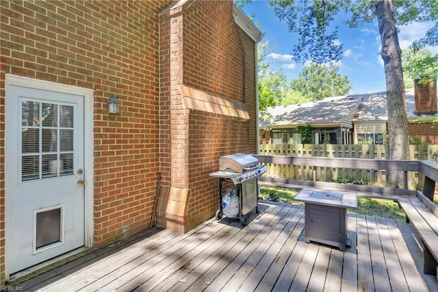 605 Hollygate Ln, Chesapeake, VA 23322 - wooden deck featuring area for grilling and an outdoor fire pit