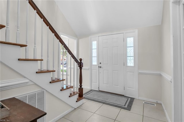605 Hollygate Ln, Chesapeake, VA 23322 - foyer featuring vaulted ceiling, light tile patterned floors, and stairway