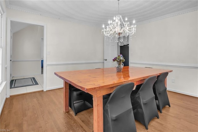 605 Hollygate Ln, Chesapeake, VA 23322 - dining area with a chandelier, light wood-style flooring, and ornamental molding