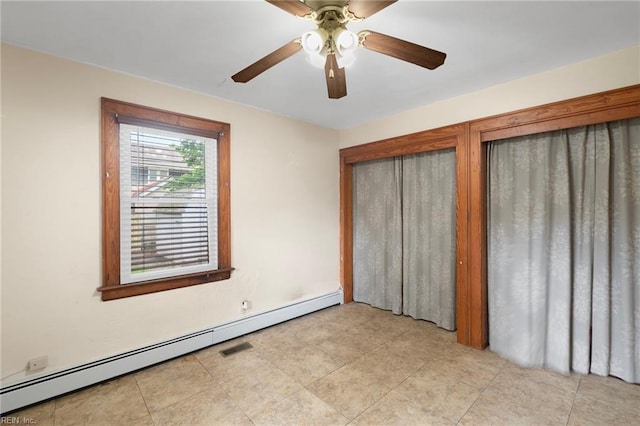 440 Maryland Ave, Norfolk, VA 23508 - unfurnished bedroom with a baseboard radiator, a ceiling fan, and light tile patterned floors