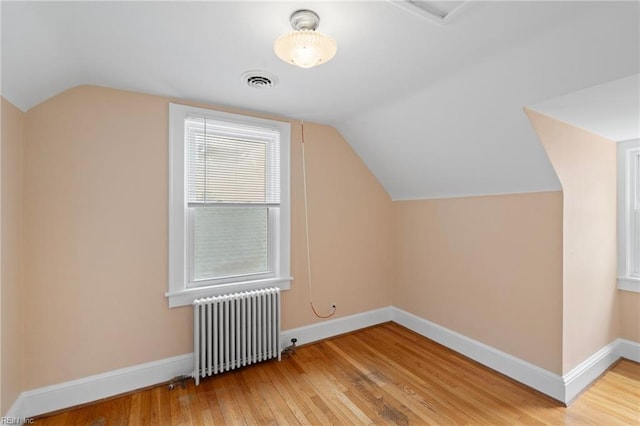 440 Maryland Ave, Norfolk, VA 23508 - bonus room featuring radiator heating unit, hardwood / wood-style flooring, and lofted ceiling