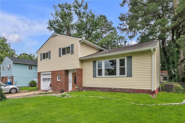 4861 Honeygrove Rd, Virginia Beach, VA 23455 - tri-level home featuring driveway, a garage, and a front lawn