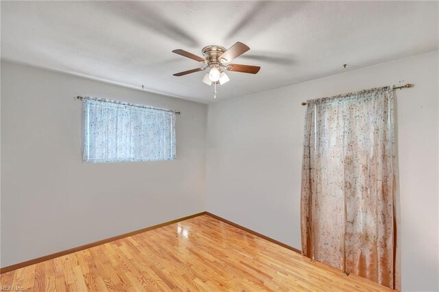 4861 Honeygrove Rd, Virginia Beach, VA 23455 - empty room with a ceiling fan and wood finished floors