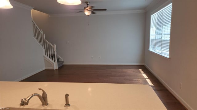 217 Wineberry Way, Yorktown, VA 23692 - unfurnished living room featuring healthy amount of natural light, ceiling fan, wood finished floors, and ornamental molding