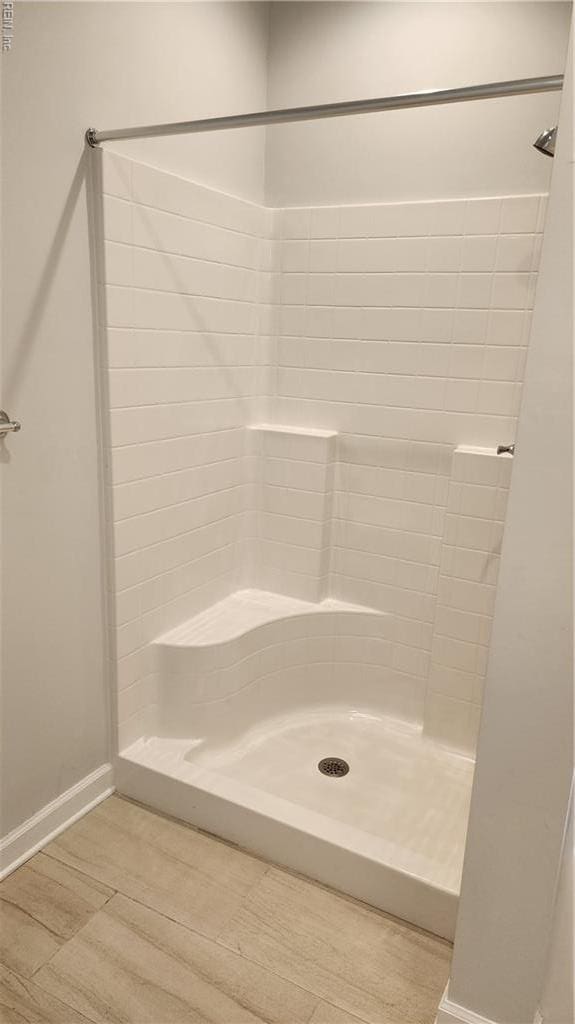 217 Wineberry Way, Yorktown, VA 23692 - bathroom featuring a stall shower and wood finished floors