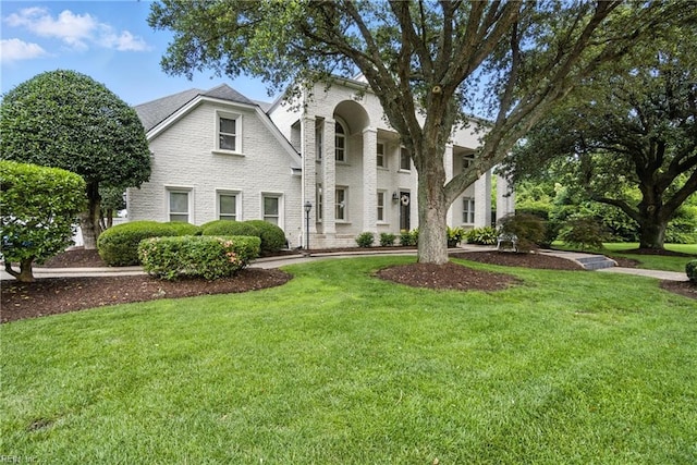 4028 Timber Ridge Dr, Virginia Beach, VA 23455 - view of front facade featuring a front lawn and brick siding