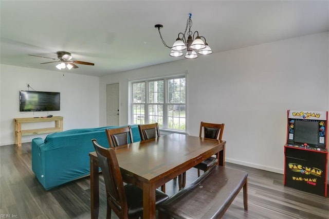 540 Draper Dr, Norfolk, VA 23505 - dining space featuring dark wood-style floors, a chandelier, and a ceiling fan