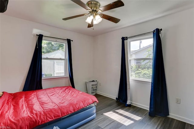 540 Draper Dr, Norfolk, VA 23505 - bedroom with wood finished floors, multiple windows, and a ceiling fan
