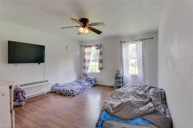 540 Draper Dr, Norfolk, VA 23505 - bedroom featuring wood finished floors, a ceiling fan, and a wall unit AC