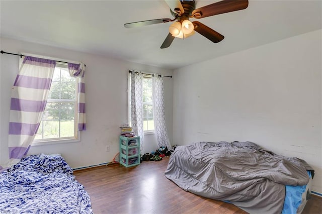 540 Draper Dr, Norfolk, VA 23505 - bedroom featuring multiple windows, wood finished floors, and ceiling fan
