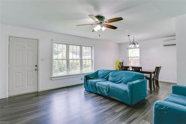 540 Draper Dr, Norfolk, VA 23505 - living room with wood finished floors, ceiling fan, and a wall mounted AC