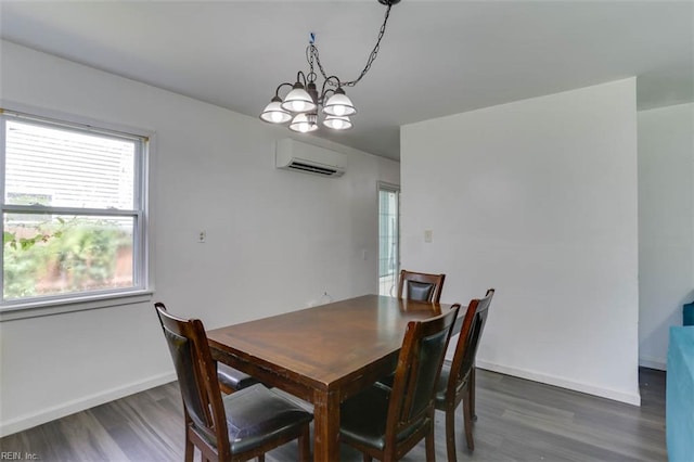 540 Draper Dr, Norfolk, VA 23505 - dining room with a wall unit AC, wood finished floors, and a chandelier