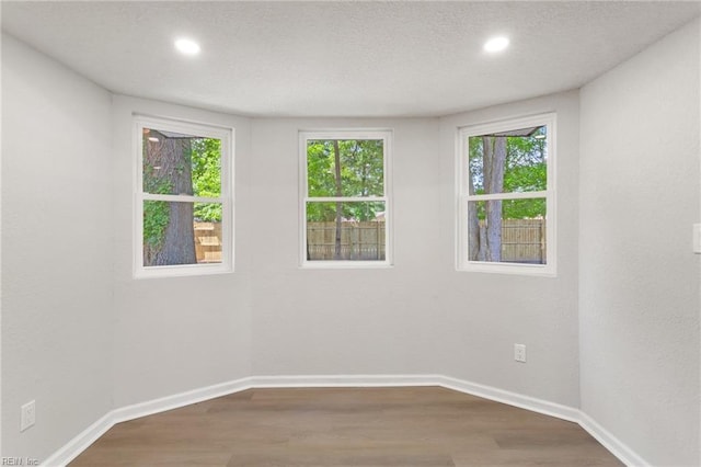 4809 Orchard Ln, Virginia Beach, VA 23464 - empty room featuring dark wood-style flooring and recessed lighting