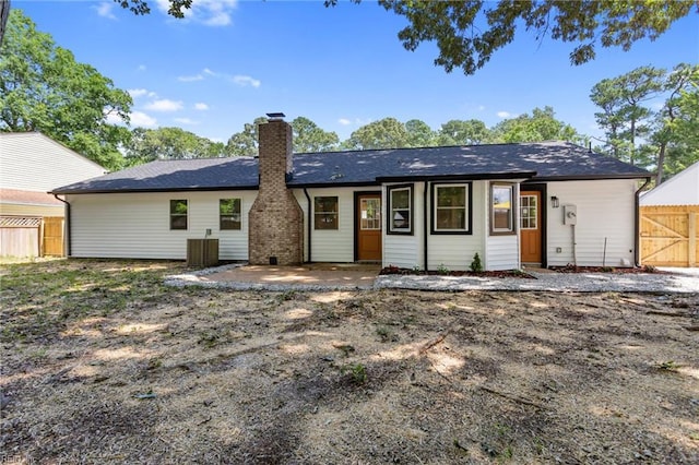 4809 Orchard Ln, Virginia Beach, VA 23464 - back of property with a chimney and a patio