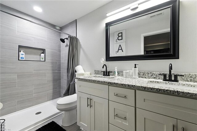 78 Calvary Ter, Hampton, VA 23666 - bathroom featuring double vanity and tiled shower