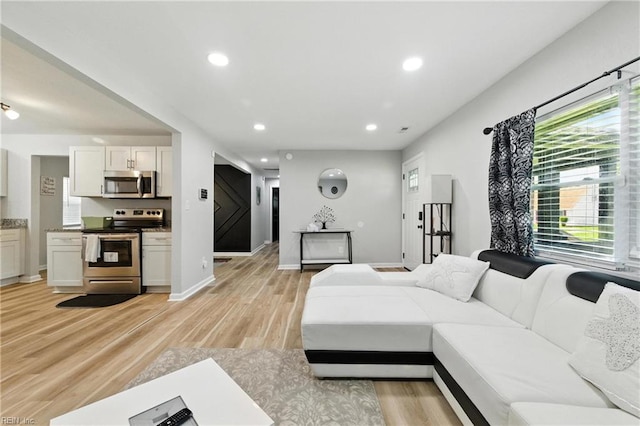 78 Calvary Ter, Hampton, VA 23666 - living room featuring plenty of natural light, light wood-style flooring, and recessed lighting