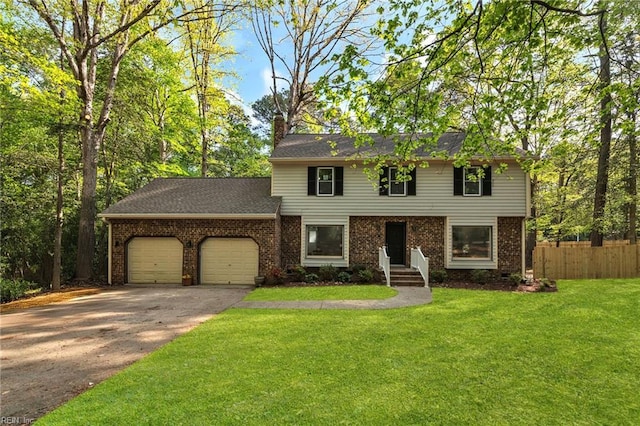 2 Clarendon Ct, Williamsburg, VA 23188 - colonial home with an attached garage, concrete driveway, a chimney, and brick siding
