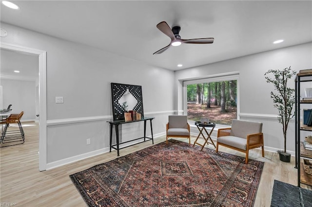 2 Clarendon Ct, Williamsburg, VA 23188 - living area with wood finished floors, wainscoting, a ceiling fan, and recessed lighting