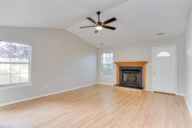 816 Mccrae Dr, Newport News, VA 23608 - unfurnished living room with ceiling fan, light wood finished floors, vaulted ceiling, and a fireplace with raised hearth