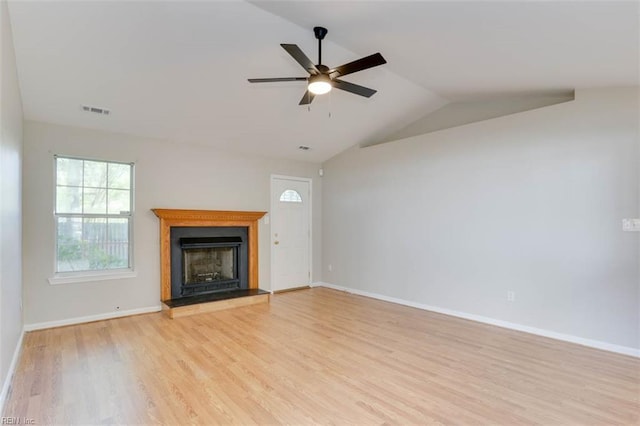 816 Mccrae Dr, Newport News, VA 23608 - unfurnished living room featuring light wood-style flooring, a fireplace with raised hearth, a ceiling fan, and lofted ceiling