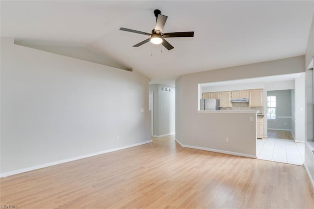 816 Mccrae Dr, Newport News, VA 23608 - unfurnished living room with a ceiling fan, light wood-style floors, and lofted ceiling