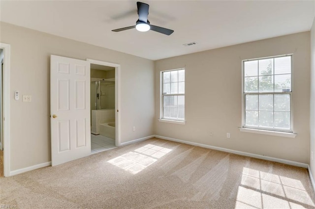 816 Mccrae Dr, Newport News, VA 23608 - unfurnished bedroom with light colored carpet, connected bathroom, and ceiling fan