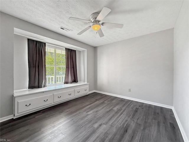 100 Peacepipe Pl, Williamsburg, VA 23185 - empty room with dark wood-type flooring, a ceiling fan, and a textured ceiling