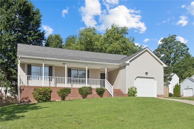 100 Peacepipe Pl, Williamsburg, VA 23185 - ranch-style house featuring a porch, a garage, concrete driveway, and a front yard