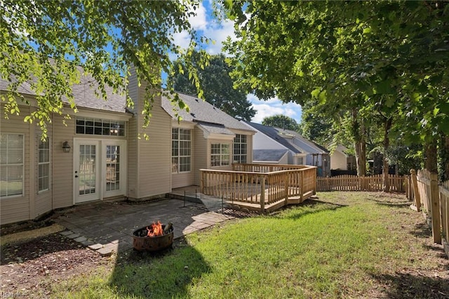 100 Peacepipe Pl, Williamsburg, VA 23185 - rear view of property with an outdoor fire pit, a fenced backyard, a deck, a chimney, and a patio