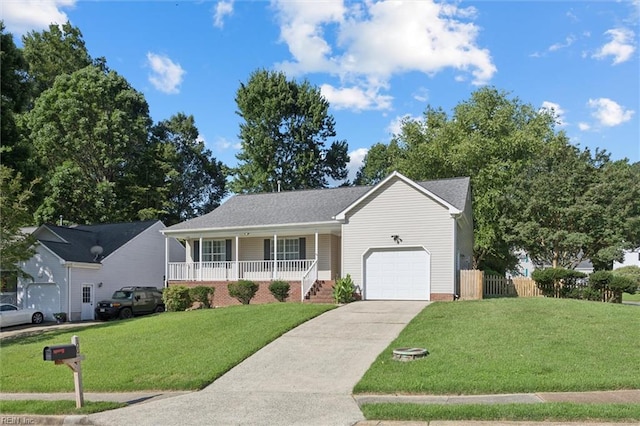 100 Peacepipe Pl, Williamsburg, VA 23185 - view of front of property with a garage, a porch, and concrete driveway