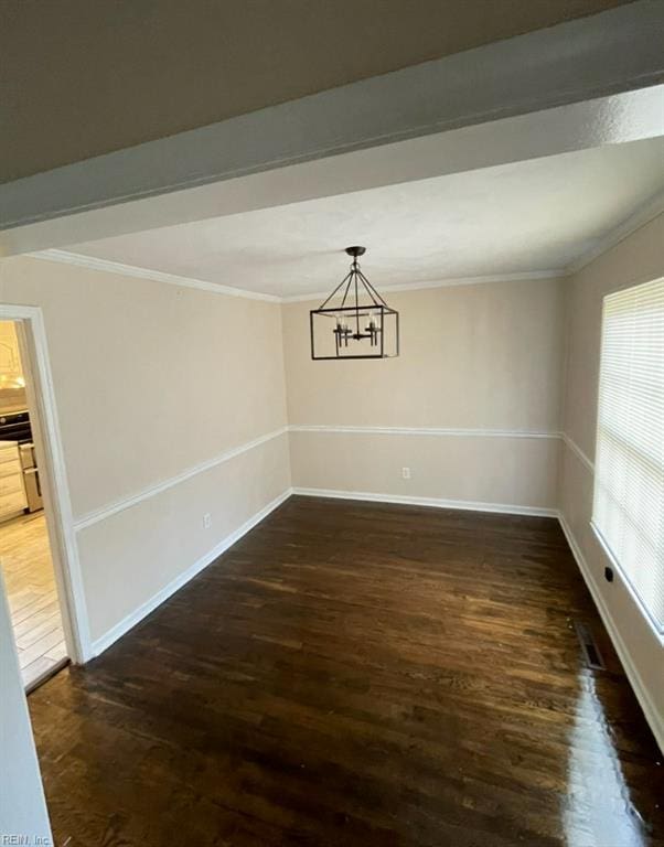 2932 Sunrise Ave, Chesapeake, VA 23324 - unfurnished dining area with wood finished floors, crown molding, and a chandelier