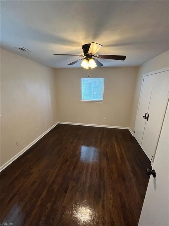 2932 Sunrise Ave, Chesapeake, VA 23324 - unfurnished bedroom featuring dark wood-style floors and a ceiling fan