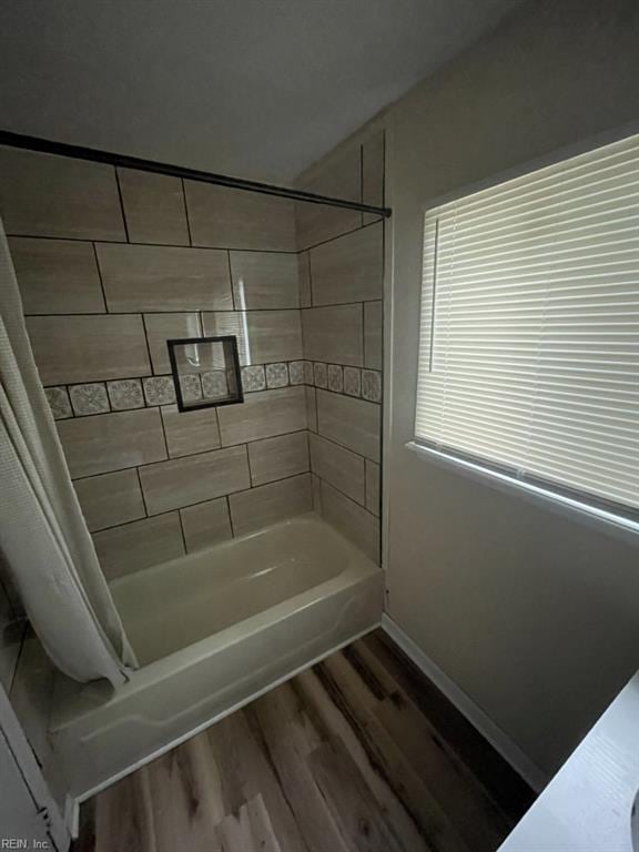 2932 Sunrise Ave, Chesapeake, VA 23324 - full bathroom featuring wood finished floors and shower / bath combination with curtain