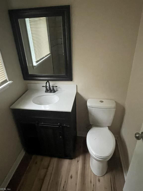 2932 Sunrise Ave, Chesapeake, VA 23324 - bathroom featuring vanity and wood finished floors