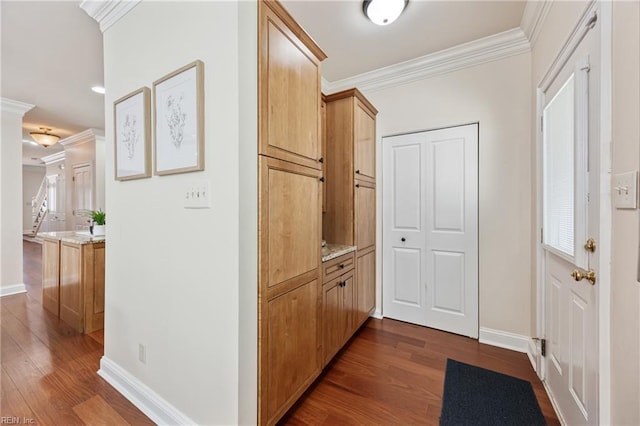 623 London St, Portsmouth, VA 23704 - corridor featuring dark wood finished floors and crown molding