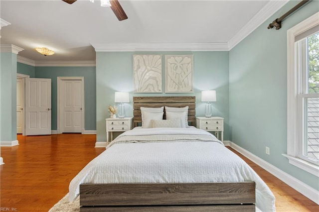 623 London St, Portsmouth, VA 23704 - bedroom featuring crown molding, wood finished floors, and a ceiling fan