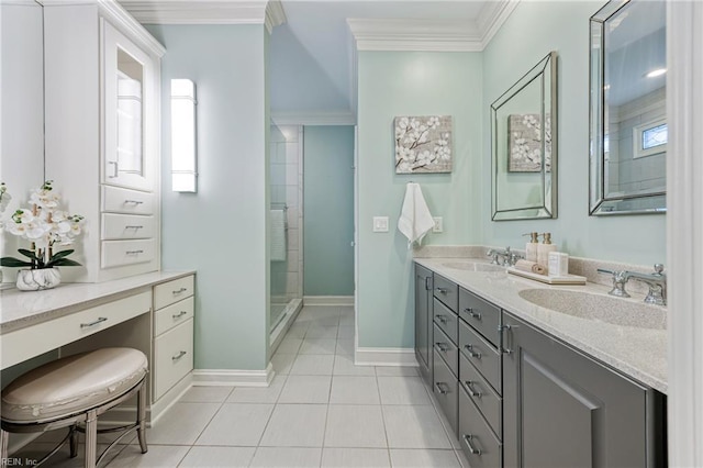 623 London St, Portsmouth, VA 23704 - bathroom featuring crown molding, double vanity, tile patterned floors, and a stall shower