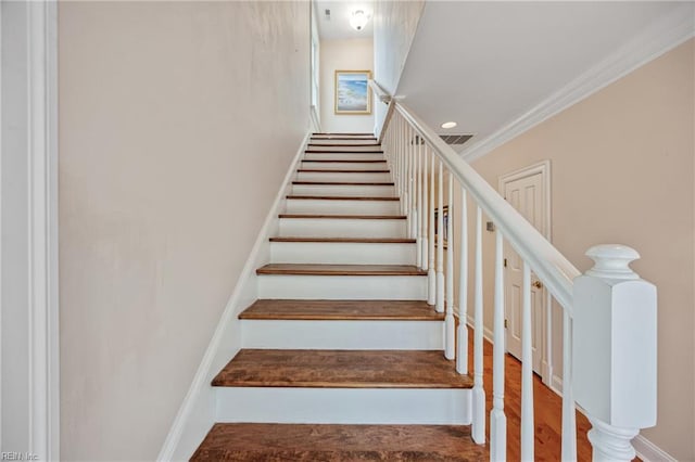 623 London St, Portsmouth, VA 23704 - staircase with wood finished floors, ornamental molding, and recessed lighting