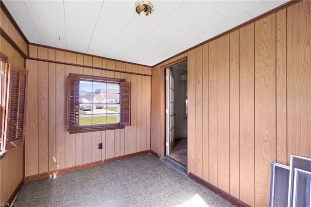 1132 Proctor St, Suffolk, VA 23434 - spare room with wood walls and ornamental molding