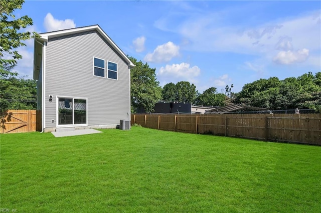 464 Factory St, Suffolk, VA 23434 - back of house with a fenced backyard and a patio area