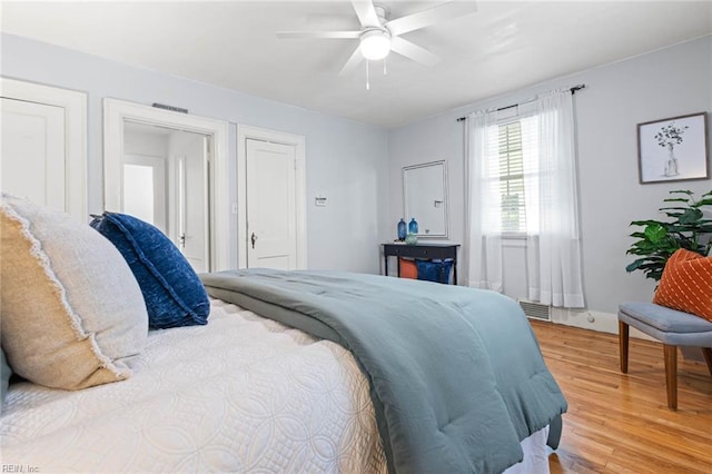 414 Russell St, Portsmouth, VA 23707 - bedroom with light wood finished floors and a ceiling fan