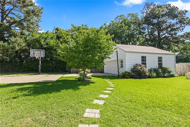 414 Russell St, Portsmouth, VA 23707 - view of yard featuring an outdoor structure and a garage