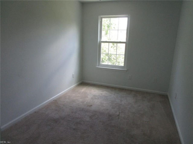 1314 18th St, Chesapeake, VA 23324 - spare room with carpet flooring and baseboards