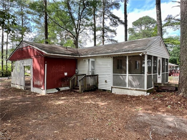 5410 Gum Fork Rd, Gloucester, VA 23061 - back of house with a sunroom and roof with shingles