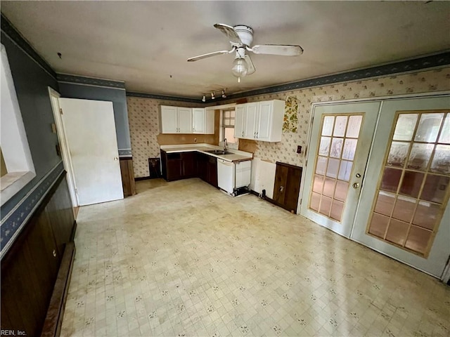 5410 Gum Fork Rd, Gloucester, VA 23061 - kitchen featuring wallpapered walls, white cabinets, a ceiling fan, french doors, and light floors