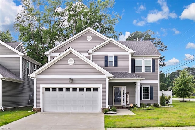 145 Blessing Cir, Suffolk, VA 23434 - traditional-style home with concrete driveway, a front yard, and roof with shingles
