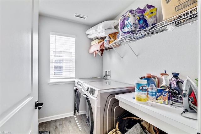 145 Blessing Cir, Suffolk, VA 23434 - laundry room featuring washer and dryer and wood finished floors